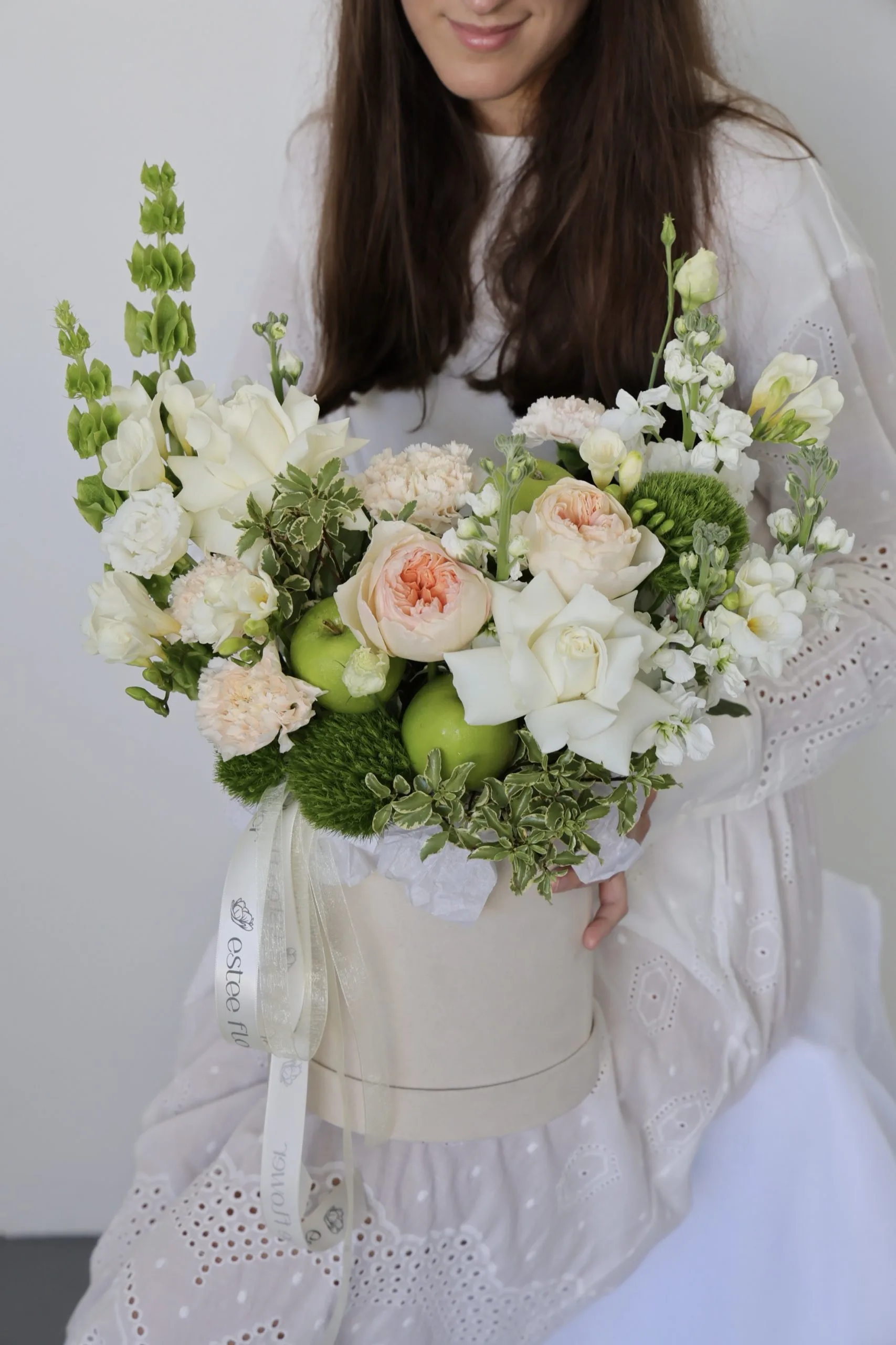Sweet year Rosh Hashanah flower arrangement in a hat box
