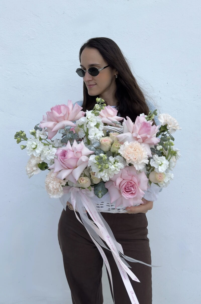 The thinking of you arrangement flower basket with garden roses and soft pastel blooms