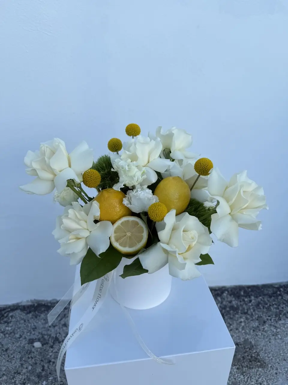Sukkot centerpiece with lemons and roses table arrangement