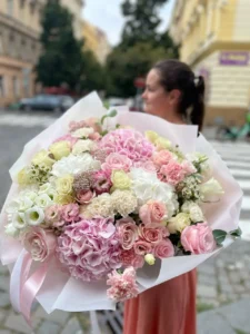Summer bouquet with hydrangeas lisianthus roses and carnations